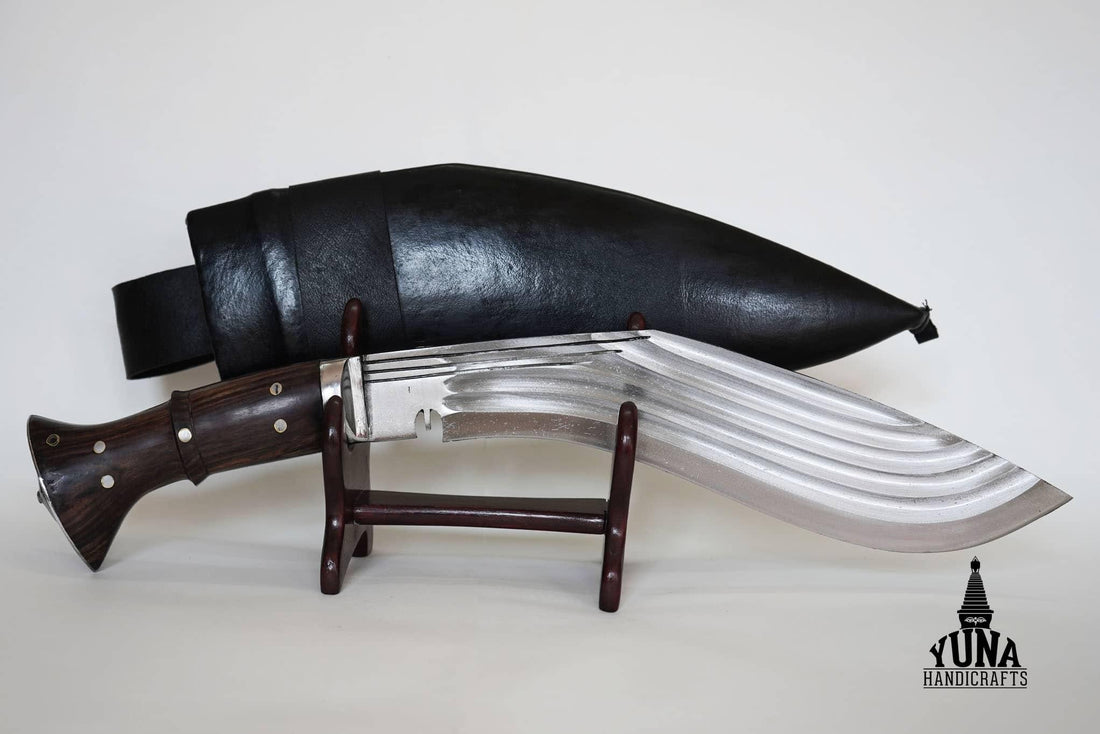 traditional kukri blade on wooden knife display