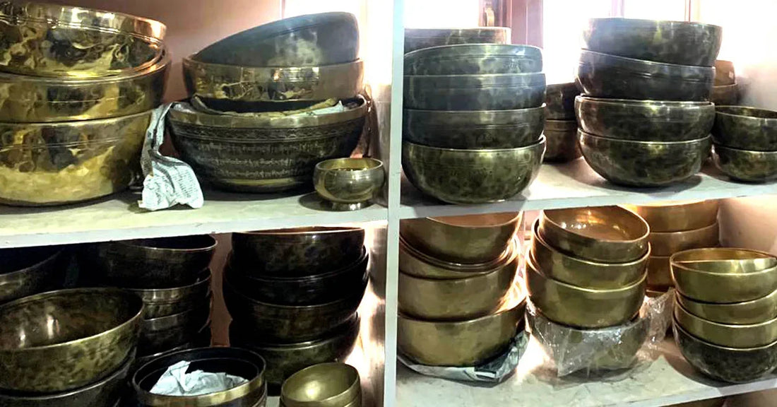 many singing bowls in rack